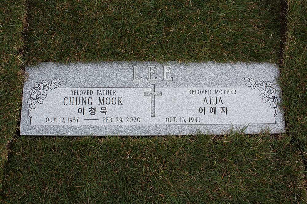 Grey granite companion marker with cross and Korean lettering