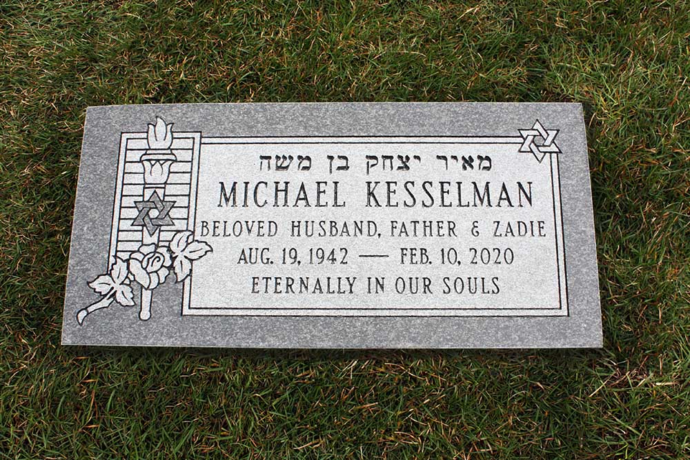 Dark grey granite marker with Hebrew star of David and eternal flame