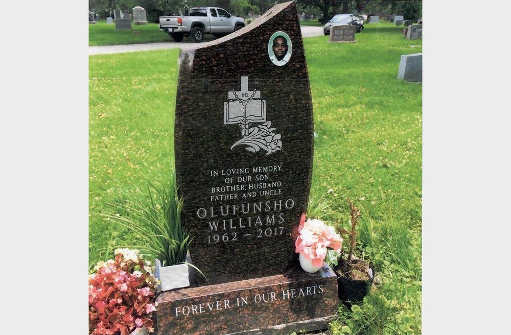 Brown Granie tall monument for single grave