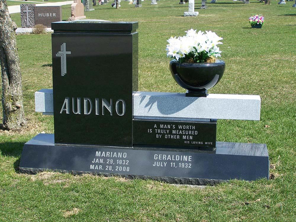 Bench monument with vase and hand-tooled letters