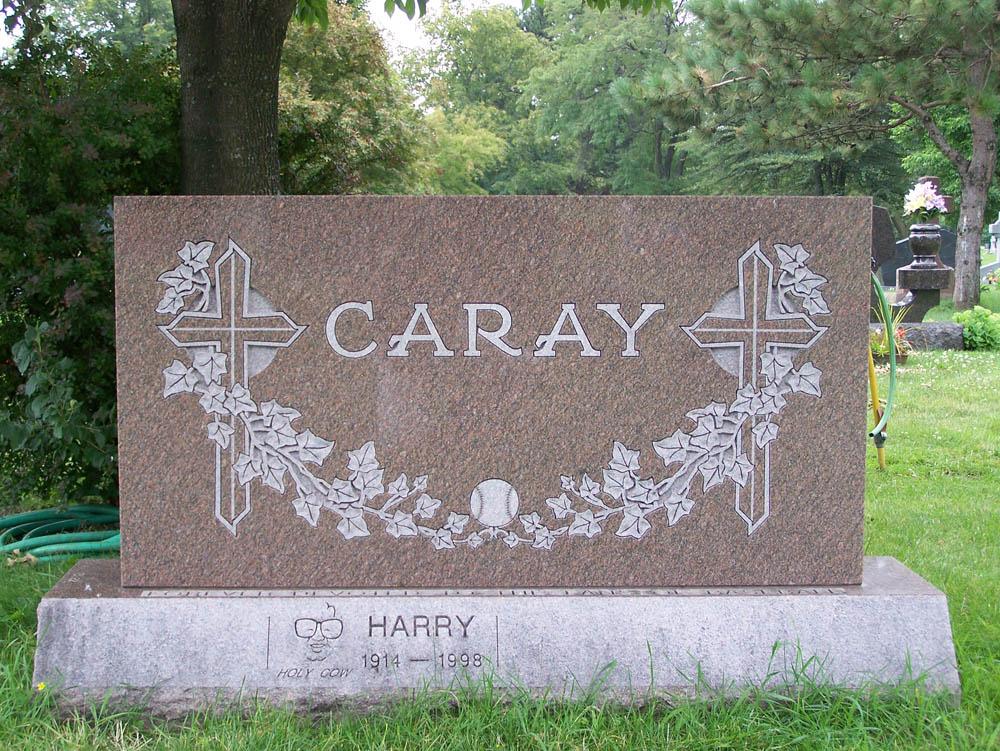 Family monument in rose granite with crosses and ivy